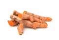 Turmeric (curcumin) rhizomes isolated on a white background. Royalty Free Stock Photo