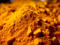 Turmeric marco close up. Turmeric powder or curcuma powder made of turmeric root, popular indian spice. Main component in Indian