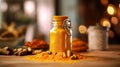 Turmeric powder in a glass jar on a wooden table Royalty Free Stock Photo