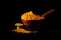 Turmeric powder and roots or barks Royalty Free Stock Photo