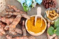 Turmeric powder with tumeric capsules for health. Royalty Free Stock Photo