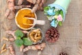 Turmeric powder with tumeric capsules for health. Royalty Free Stock Photo