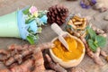 Turmeric powder with tumeric capsules for health. Royalty Free Stock Photo