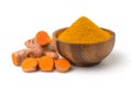 Turmeric powder in a wooden bowl and turmeric (curcumin) rhizomes. Royalty Free Stock Photo