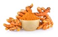 Turmeric root and dry tumeric in wood bowl Royalty Free Stock Photo