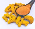 Turmeric whole and powder yellow root spice haldi curcuma closeup image stock photo