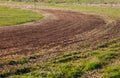 Turn of atv race track. Dust and grass Royalty Free Stock Photo