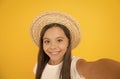 Turn back brim straw hat. Happy kid relaxing summer resort. Summer vacation outfit. Ready to relax. Teen girl summer