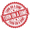TURN ON A DIME text on red round stamp sign
