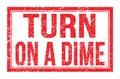 TURN ON A DIME, words on red rectangle stamp sign