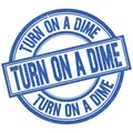 TURN ON A DIME written word on blue stamp sign