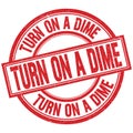 TURN ON A DIME written word on red stamp sign