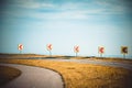 Turn left sign on a country road Royalty Free Stock Photo