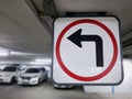 Turn Left Traffic Arrow Sign at the Parking Lot Royalty Free Stock Photo