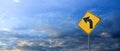 Turn left yellow road sign on blue sky Royalty Free Stock Photo