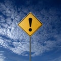 Turn left yellow road sign on blue sky Royalty Free Stock Photo