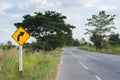 Turn right road sign on country road. Royalty Free Stock Photo