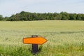 Turn right road sign in a farmers field Royalty Free Stock Photo