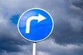 Turn right road sign on sky background with clouds Royalty Free Stock Photo