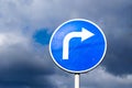 Turn right road sign on sky background with clouds Royalty Free Stock Photo