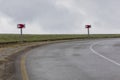 Turn Signs on a Road in the Mountains