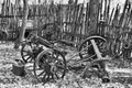 Turn of the 19th century `junk yard` with abandoned wagon wheels, buck board