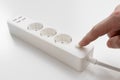 turn on. a versatile modern white extension cord with sockets and usb ports