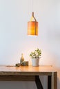 Turn on wooden lamp over the table