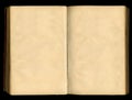 Turn of yellowed pages, old vintage open book isolated on black background Royalty Free Stock Photo