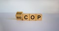 Turned cubes and changed the expression `bad cop` to `good cop`, or vice versa. Beautiful white background. Copy space Royalty Free Stock Photo