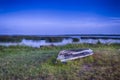 Turned Over Boat on The Ground Near Water Surface in Belarussian National Park Braslav Lakes