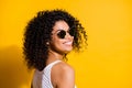 Turned photo of charming afro american woman happy smile wear white tank-top  on vibrant yellow color background Royalty Free Stock Photo