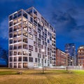 Apartment building at night at New Kaai area in Turnhout, Flanders, Belgium