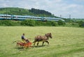 Turning hay on the farm