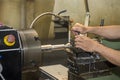 The turning machine operator working with lathe machine Royalty Free Stock Photo