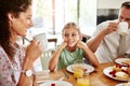 Turning mealtime into quality time. a family having breakfast together at home. Royalty Free Stock Photo