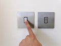 Turning On Modern Electric Switch With Finger. Selective Focus Royalty Free Stock Photo