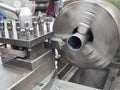 Turning part by manual lathe machine