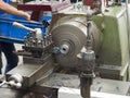 Turning part by manual lathe machine