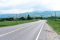 Turning road with markings for cars Royalty Free Stock Photo