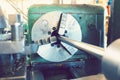 Turning threaded parts on the machine for use in mechanical engineering.