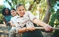 Turns out exercise can be fun. a group of teenagers playing a game of tug of war at summer camp. Royalty Free Stock Photo