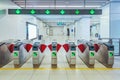 Turnstiles with electronic card readers