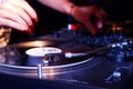 Turntable, hand of dj on the vinyl record Royalty Free Stock Photo