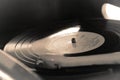Turntable, Old record player stylus on a rotating disc, vintage filtered, selective focus Royalty Free Stock Photo