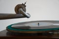 Turntable, Old record player stylus on a rotating disc, vintage filtered, selective focus Royalty Free Stock Photo