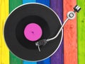 Turntable over colorful wooden planks