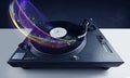 Turntable playing vinyl with glowing abstract lines Royalty Free Stock Photo