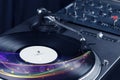 Turntable playing vinyl with glowing abstract lines Royalty Free Stock Photo