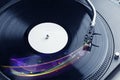 Turntable playing vinyl with glowing abstract lines Royalty Free Stock Photo